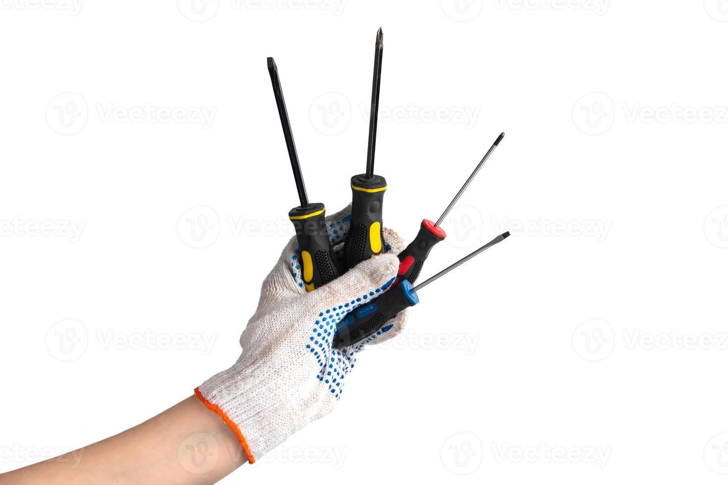 Man in white work gloves holds screwdriver. Happy labor day. Hand repair tool isolated on white background. photo