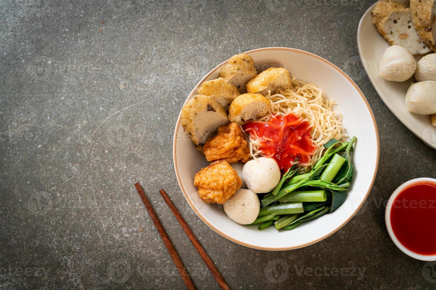 egg noodles with fish balls and shrimp balls in pink sauce, Yen Ta Four or Yen Ta Fo photo