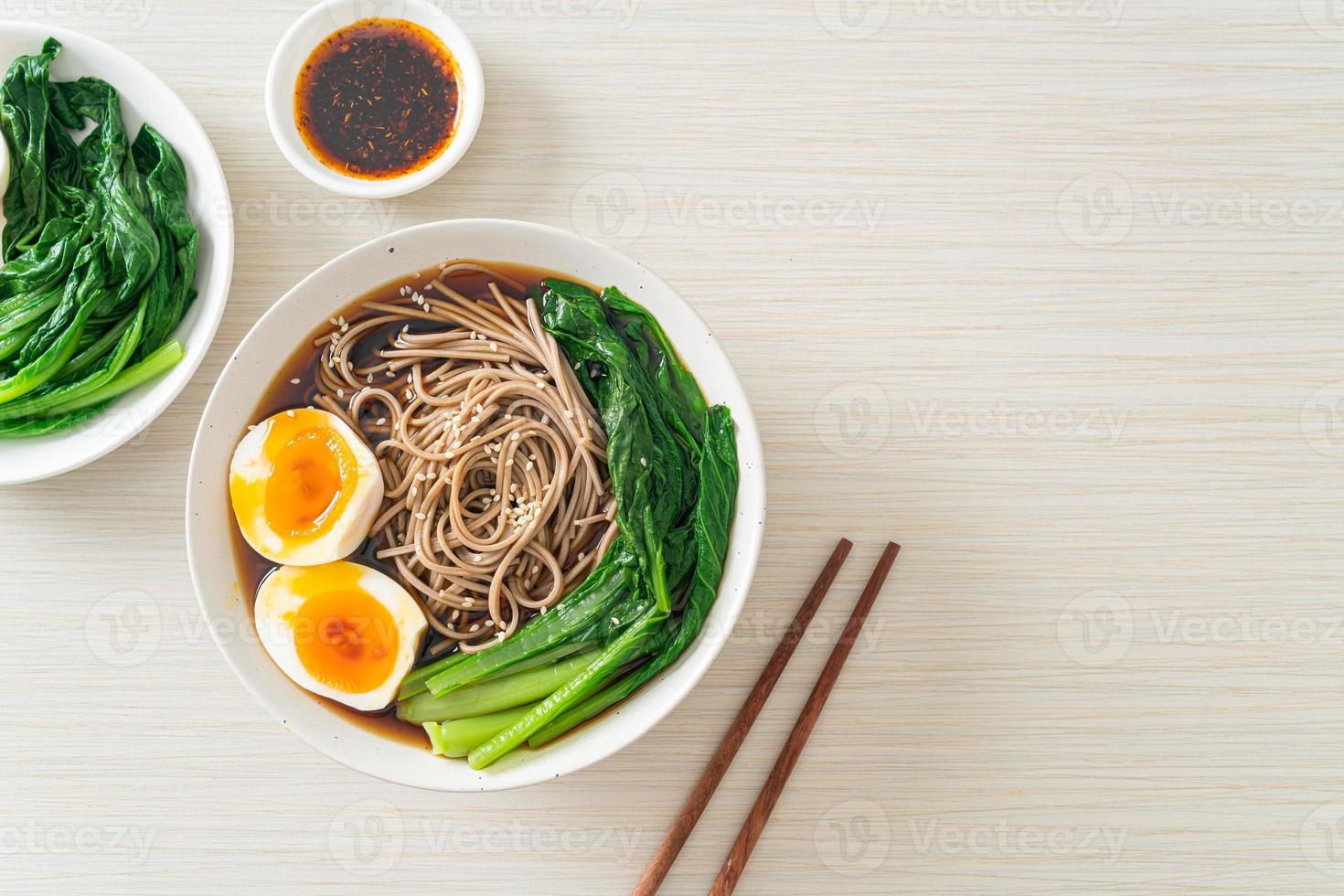 ramen noodles with egg - vegan or vegetarian food style photo