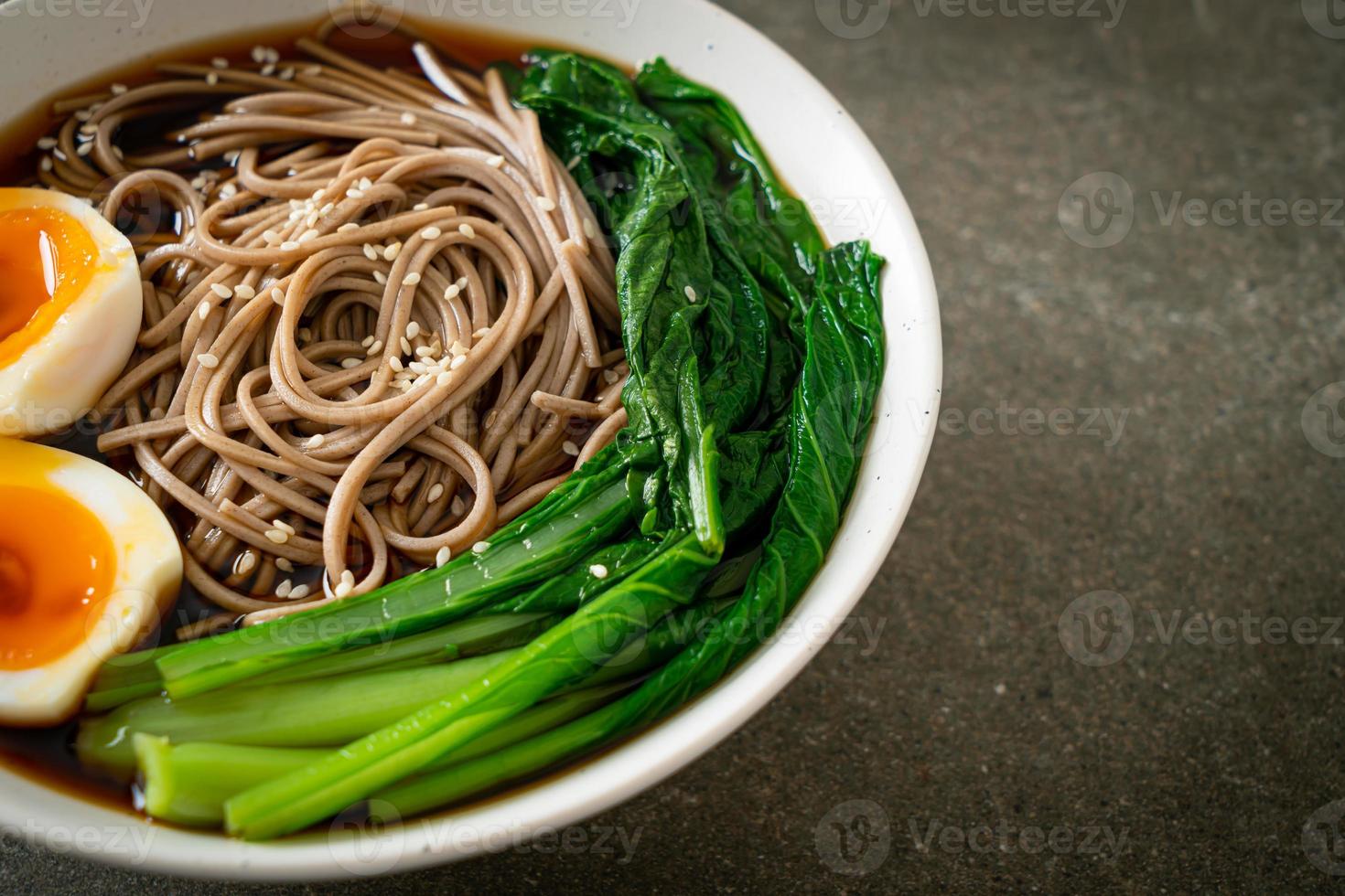 ramen noodles with egg - vegan or vegetarian food style photo