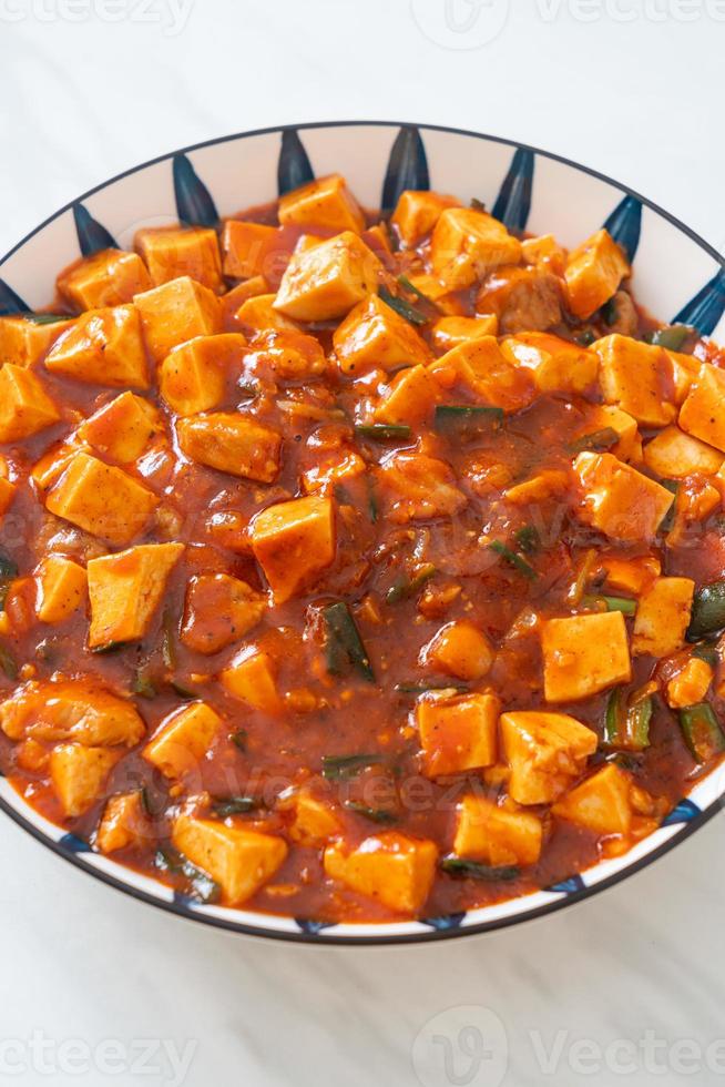 Mapo Tofu - The traditional Sichuan dish of silken tofu and ground beef, packed with mala flavor from chili oil and Sichuan peppercorns. photo