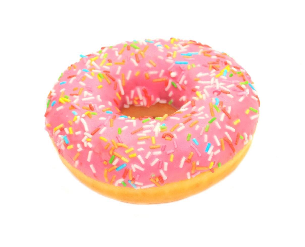 Pink glazed donut isolated on white background photo