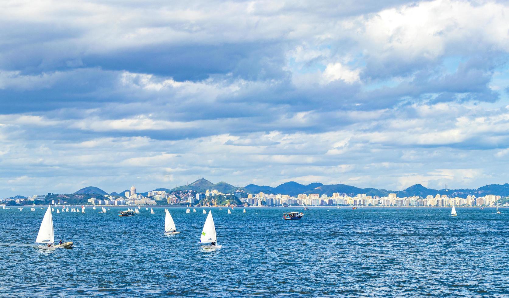 Landscape panorama coastline boats mountains Niteroi Rio de Janeiro Brazil. photo