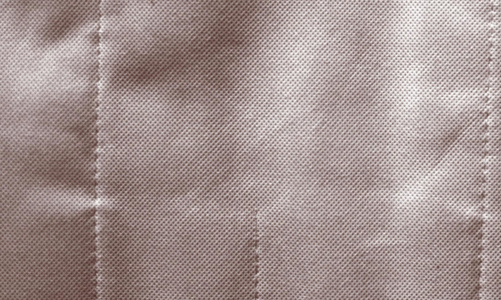 Brown wrinkled fabric texture for background photo