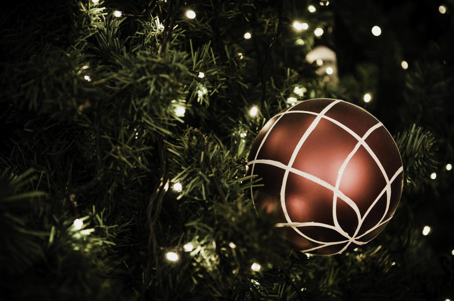 Christmas ball hanging on tree. photo