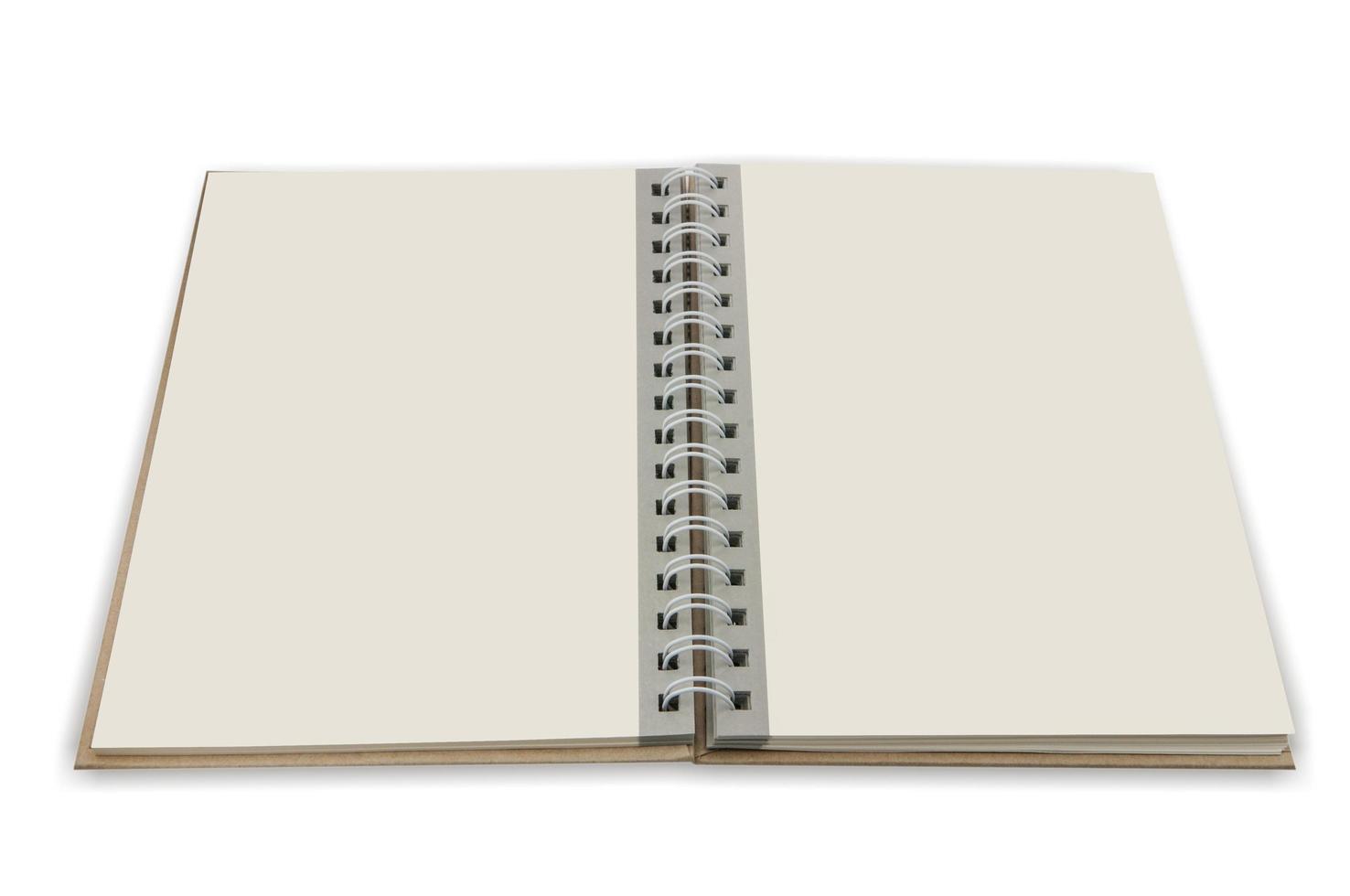 close up of open textbook with blank pages photo