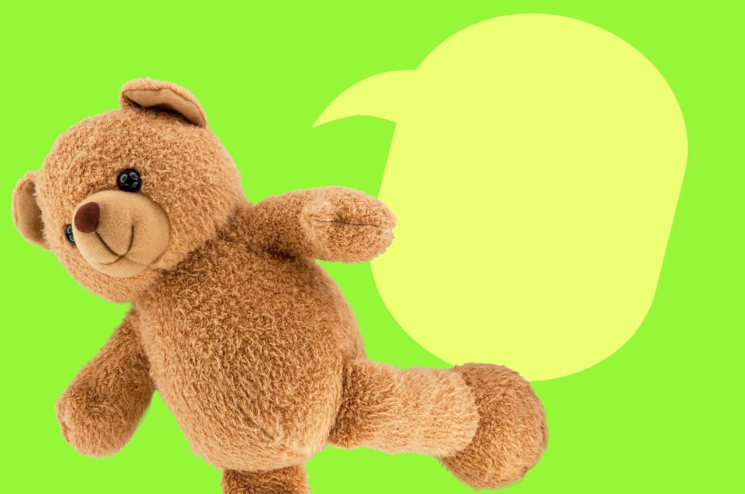 studio photo of brown light bear toy dialog