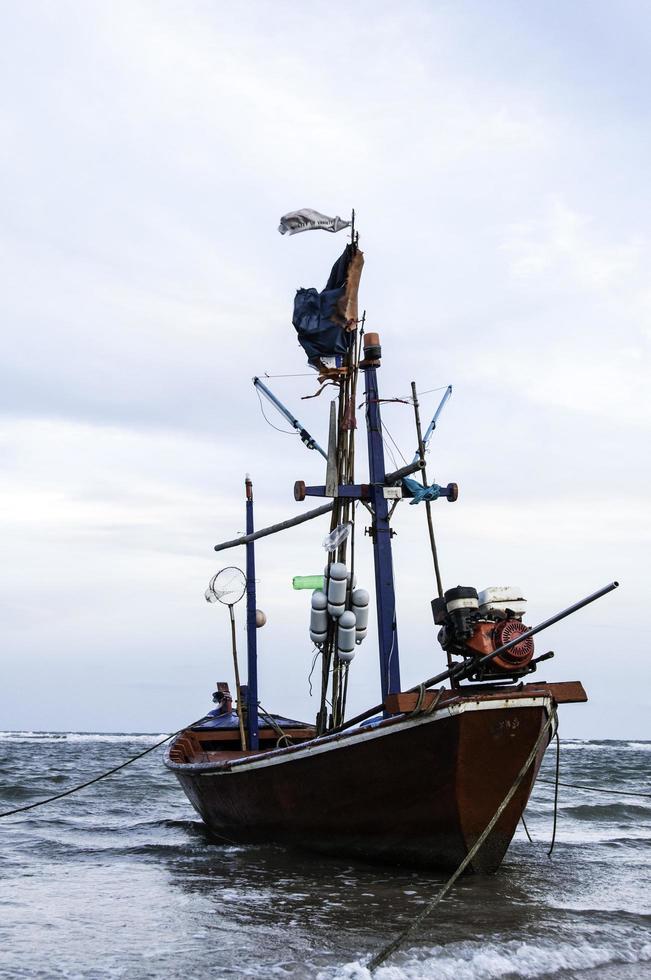 fishing boat used as a vehicle for finding fish in the sea. photo