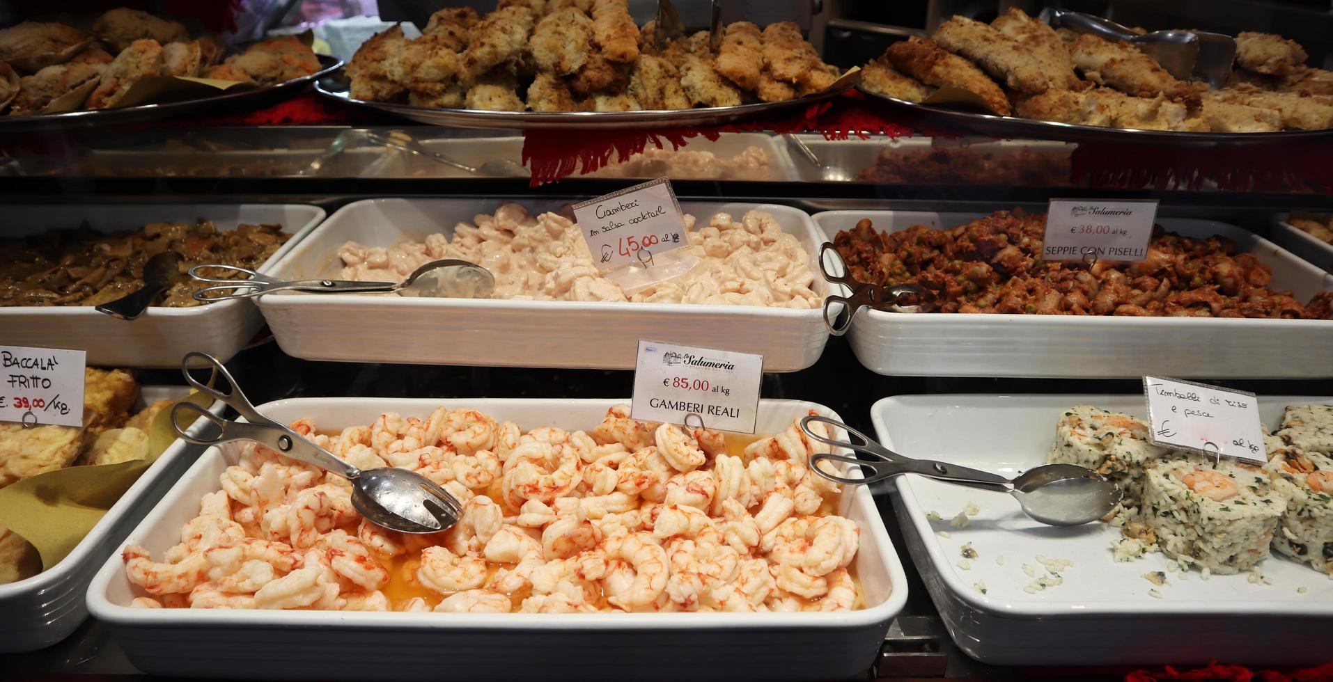 Bologna, Italy, 2021, Shop window of traditional Christmas food in Bologna. Delicatessen Italian food store photo