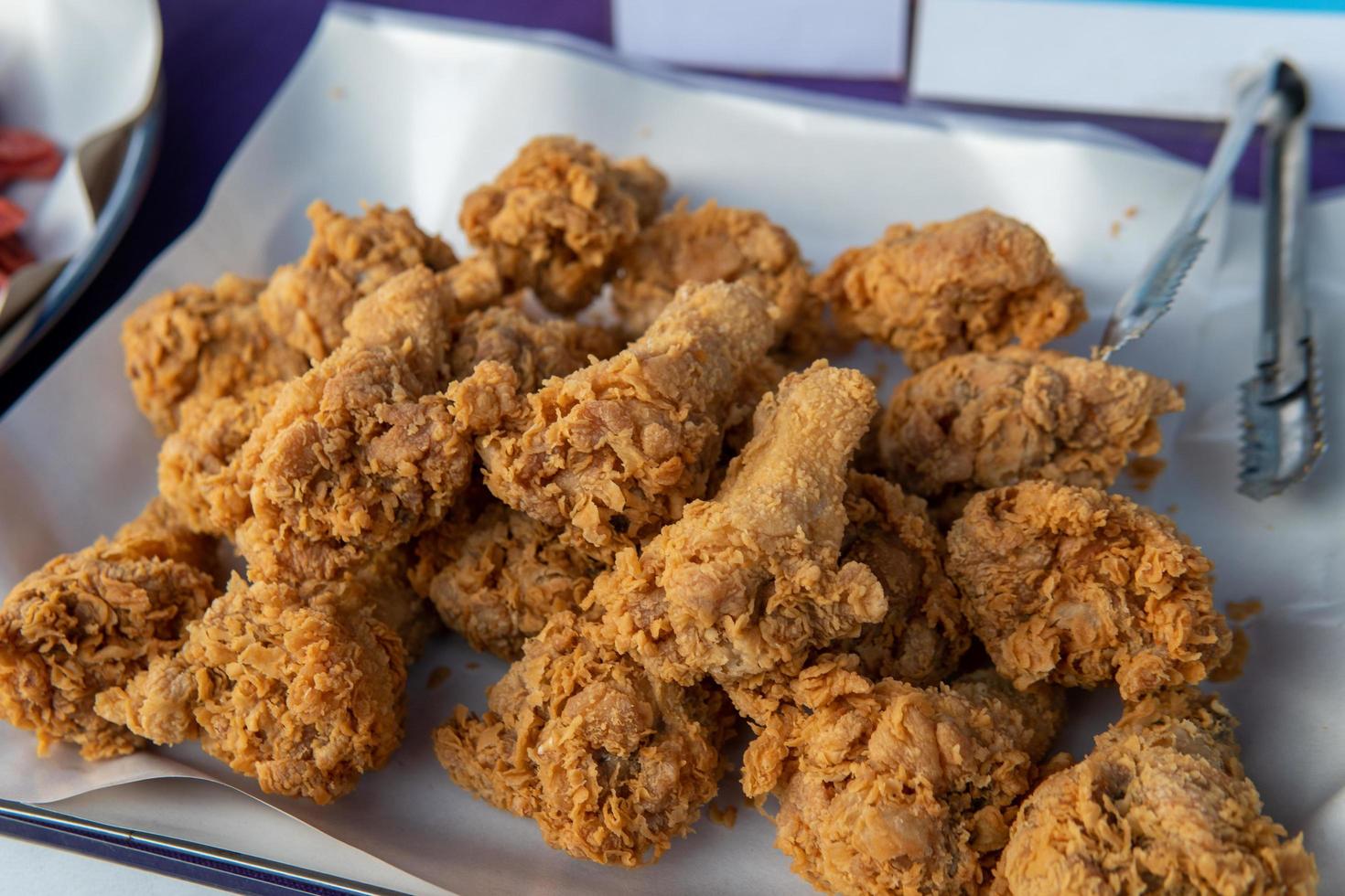 Breaded friend chicken at night market in Northern Thailand photo