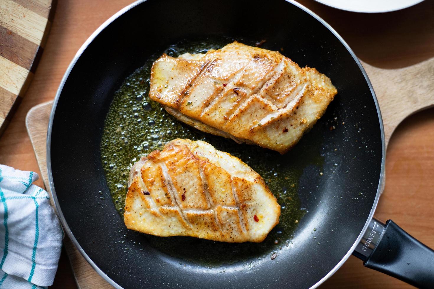 Fried meat in a pan. View from above. photo