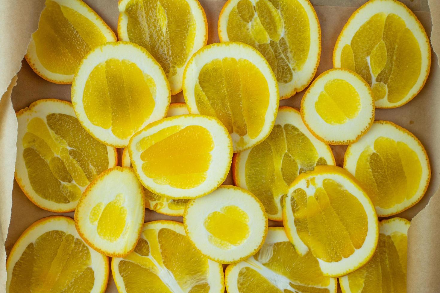 Sliced oranges ready to eat or dry in the oven. photo