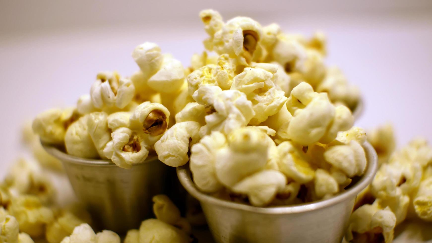 close-up of popcorn kernels on a white background in jpg format photo
