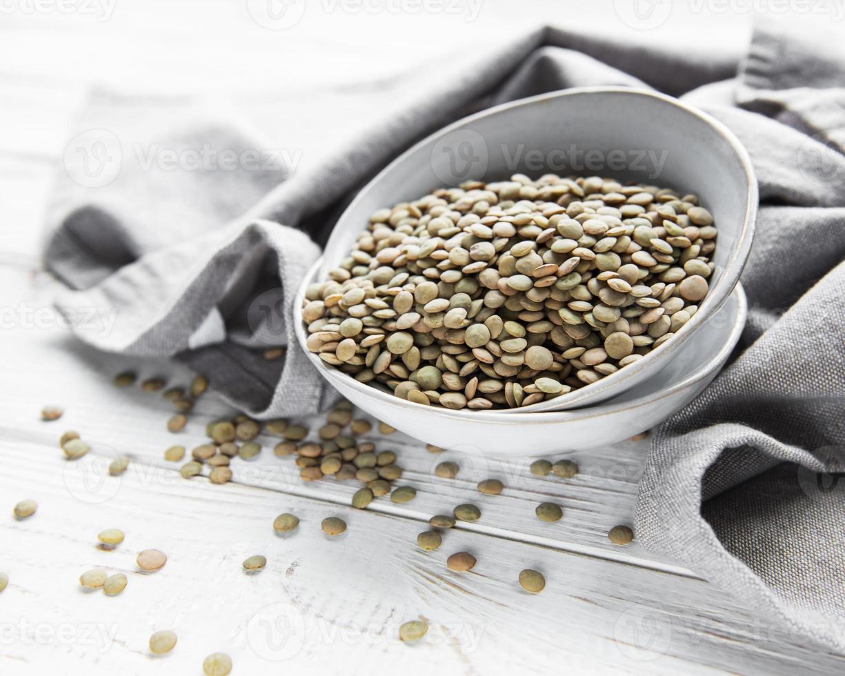 Raw lentil on a table photo