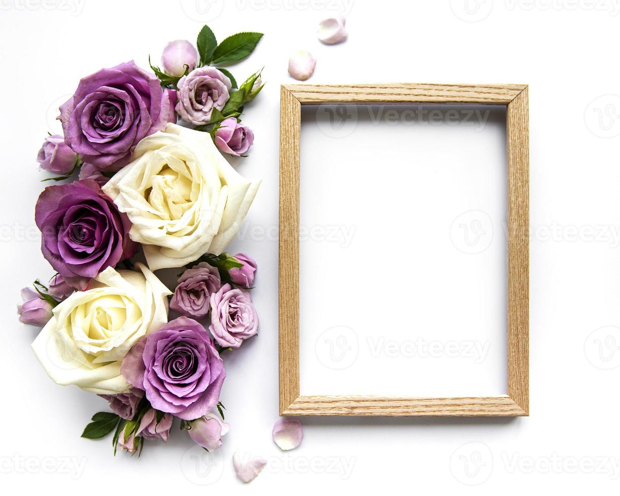 Framework from roses on white background. photo