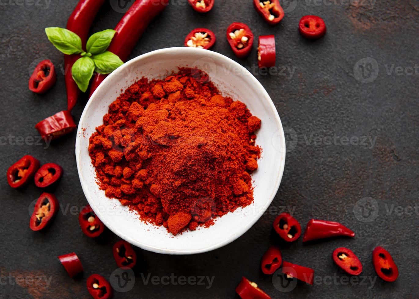 Red chili pepper, dried chillies on dark background. Top view photo