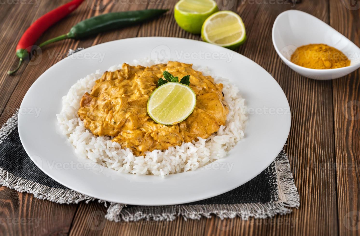 Portion of chicken curry photo