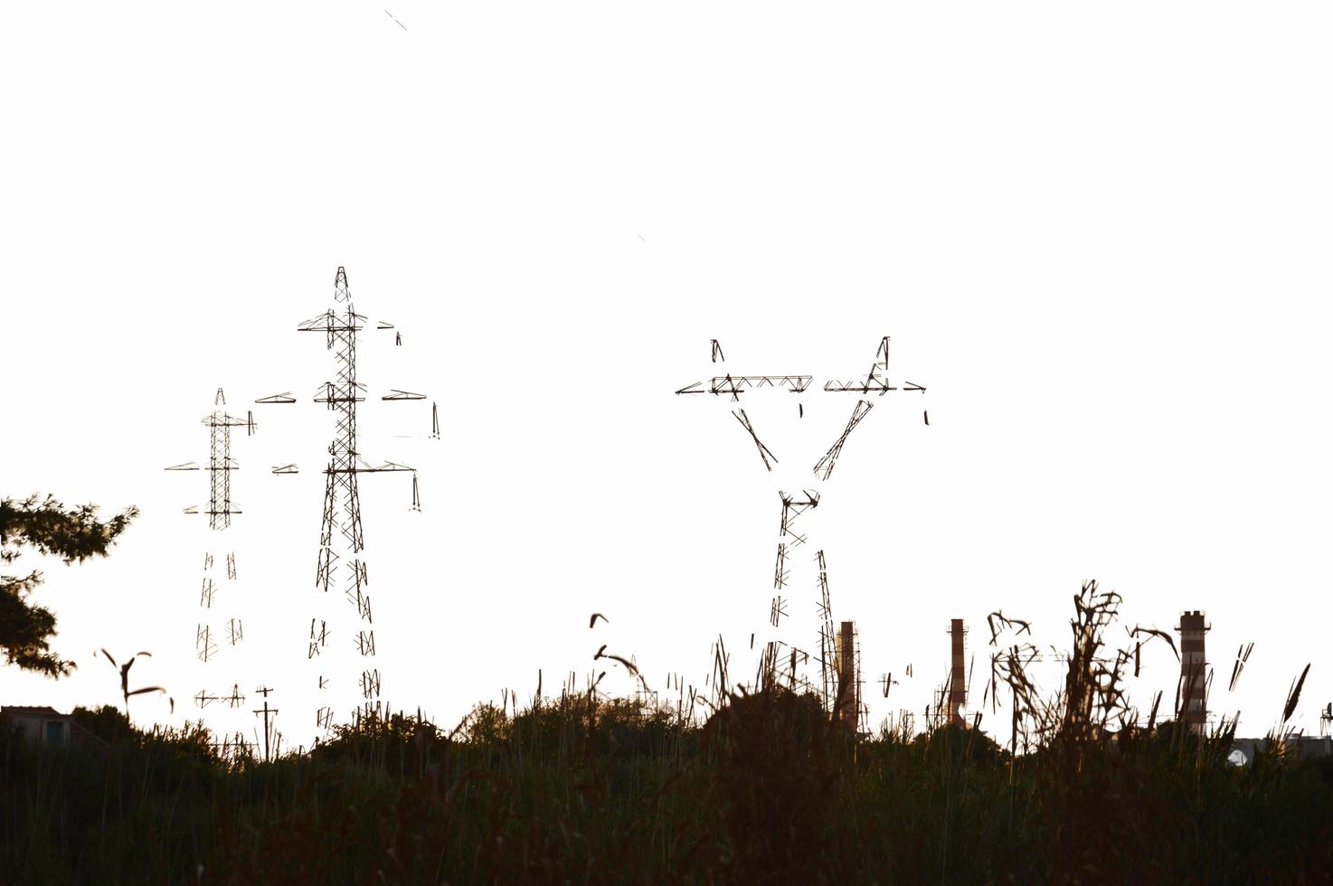 Poles and wires of high-voltage power lines photo