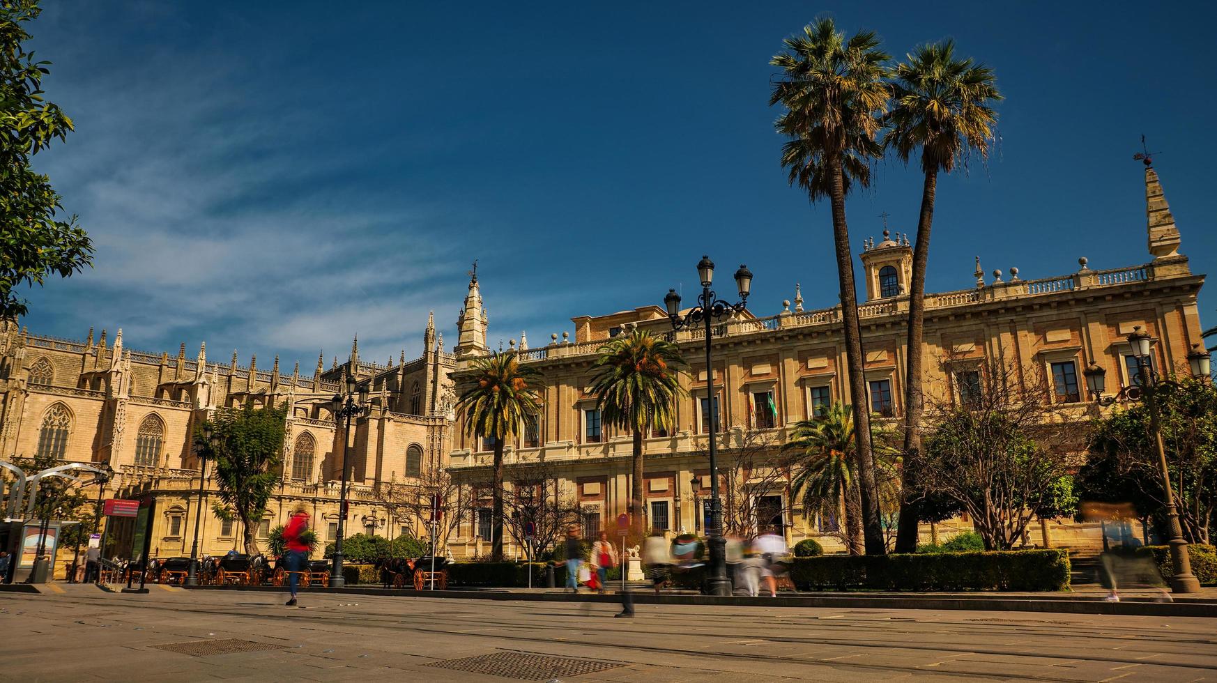 Seville, Spain - February 18th, 2020 - the Gothic Seville Cathedral and General Archive of the Indies in Seville, Spain. photo