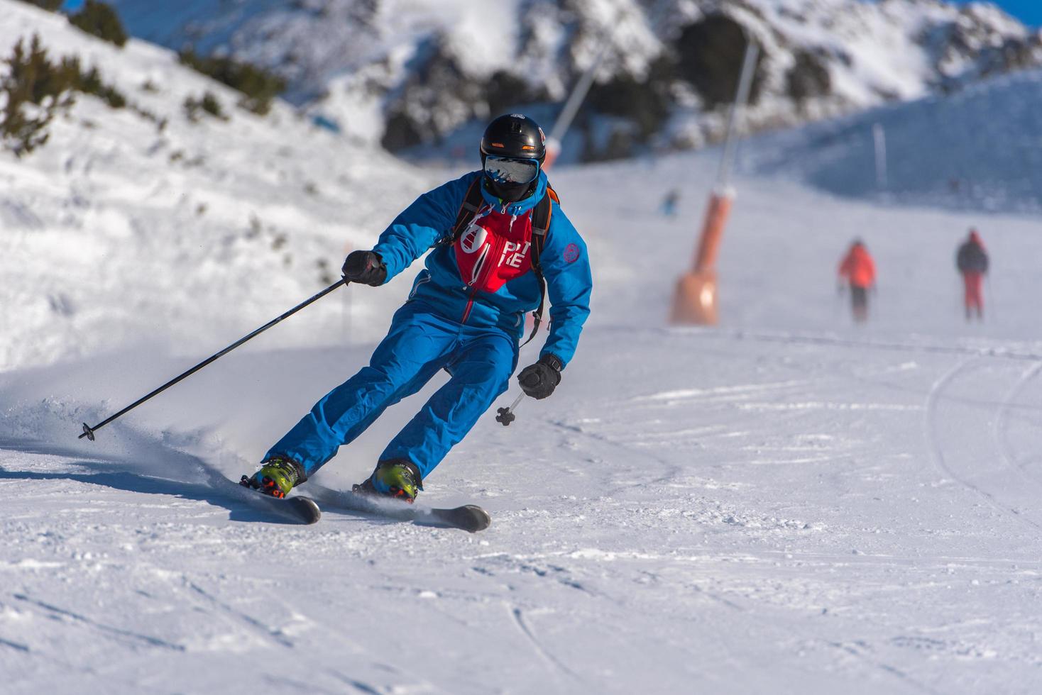 Grandvalira, Andorra . 2021 december 11 Young man skiing in the Pyrenees at the Grandvalira ski resort in Andorra in Covid19 time photo