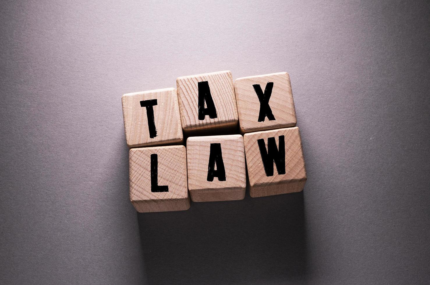 Tax Law Word with Wooden Cubes photo