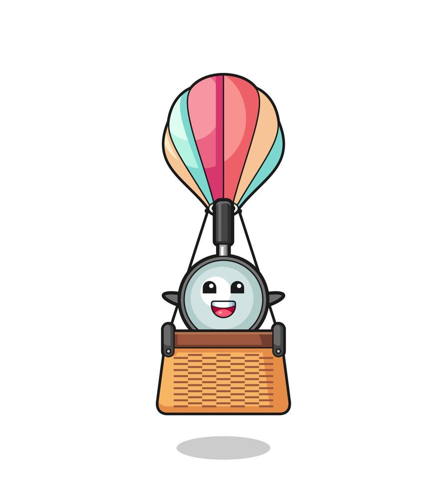 magnifying glass mascot riding a hot air balloon vector