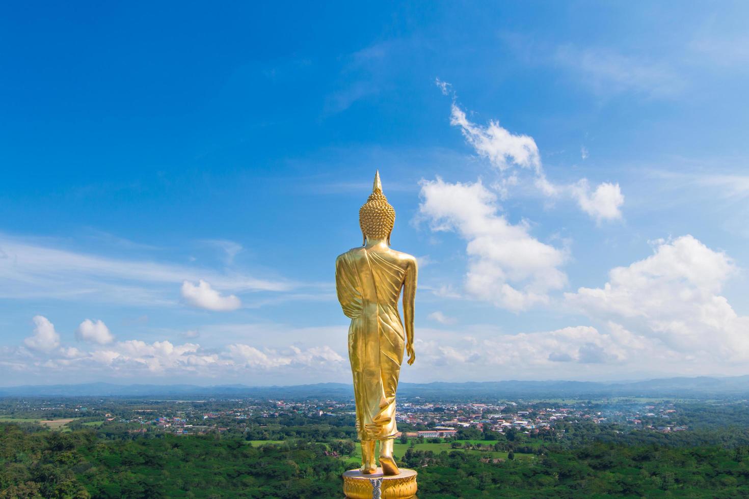 The back of golden Buddha at Khao Noi temple, Nan Thailand photo