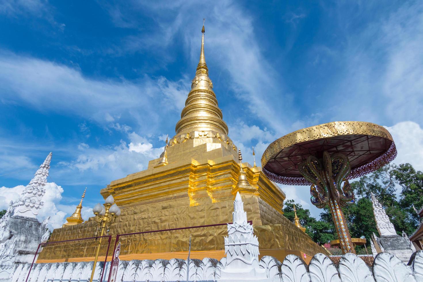 The golden pagoda of Chae Haeng temple, Nan Thailand photo