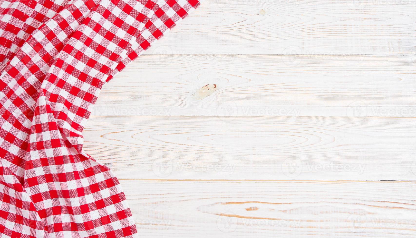 top view - red tablecloth on empty table, copy space photo