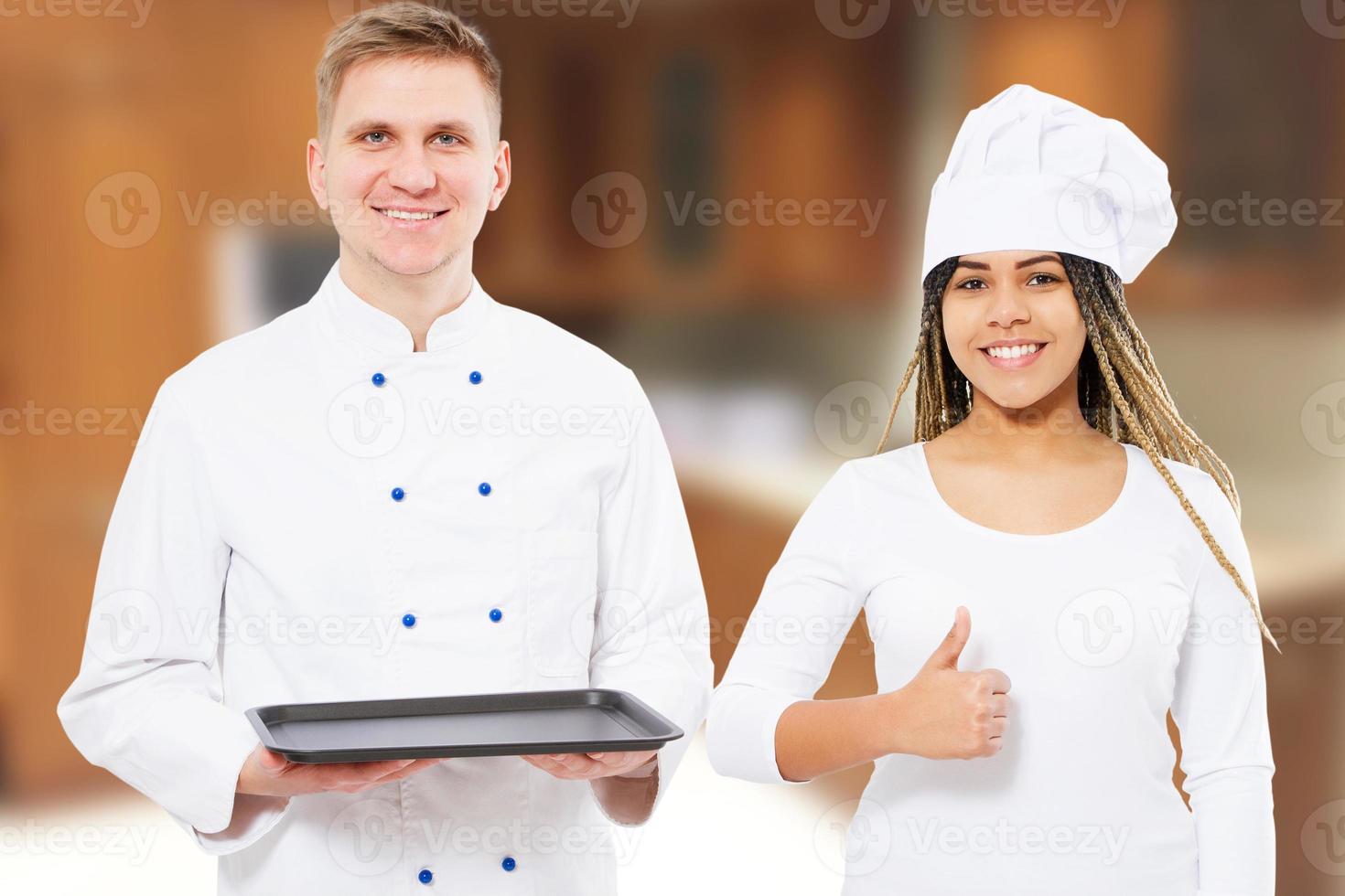 Two chefs standing in the kitchen with an empty tray mock up meal and showing like photo