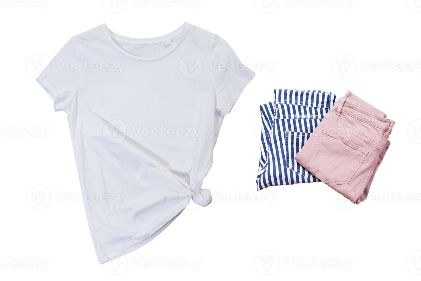 empty t shirt mockup and folded pants close up photo