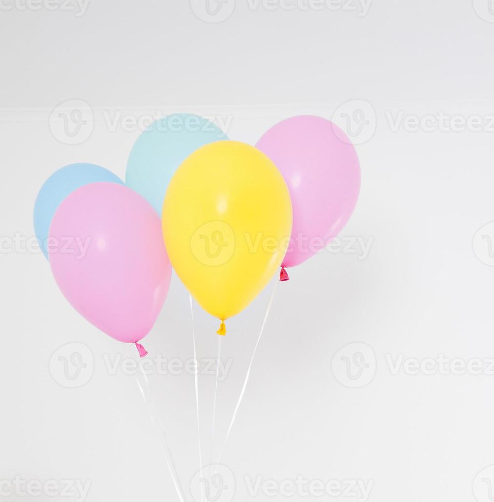Colorful party balloons background. Isolated on white. Copy space photo