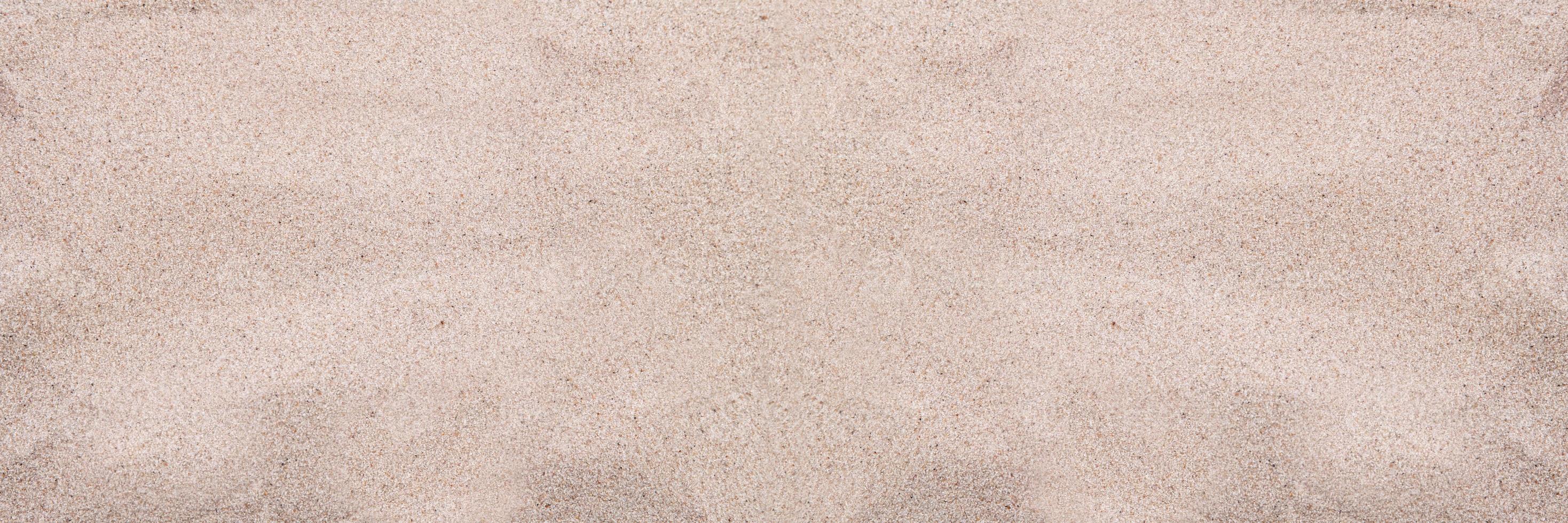 Top view sand beach background copy space, day light , photo for background or banner. White beach sand closeup for background. Tropical beach photo. Exotic island sandy beach texture