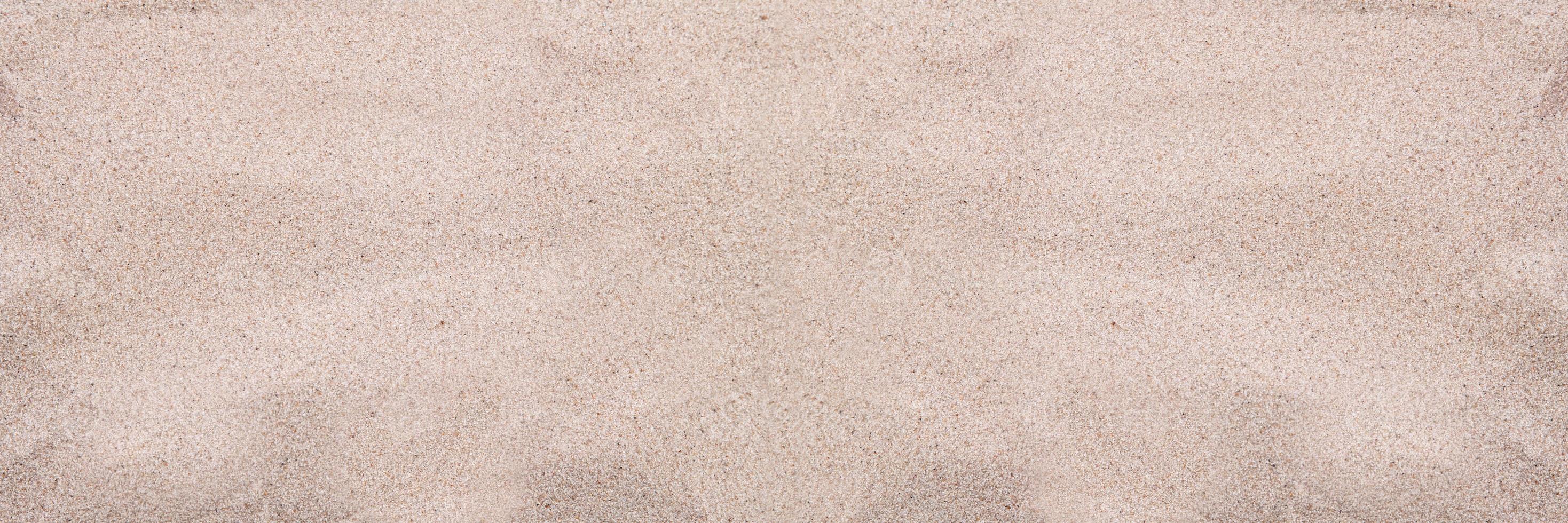 Top view sand beach background copy space, day light , photo for background or banner. White beach sand closeup for background. Tropical beach photo. Exotic island sandy beach texture