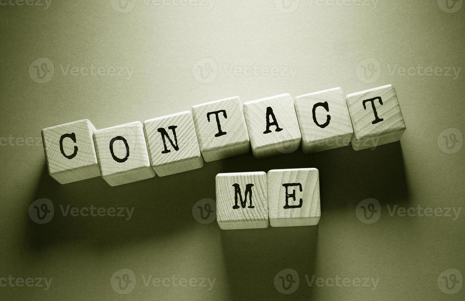 Contact Me Word with Wooden Cubes photo