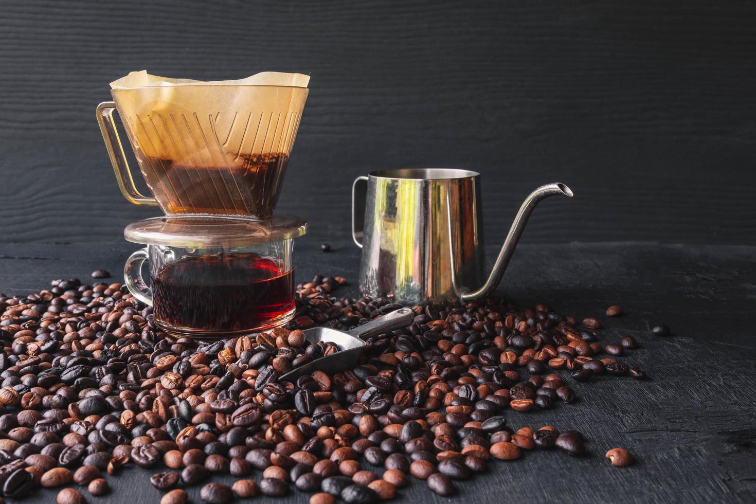 Drip coffee cup and roasted coffee beans photo