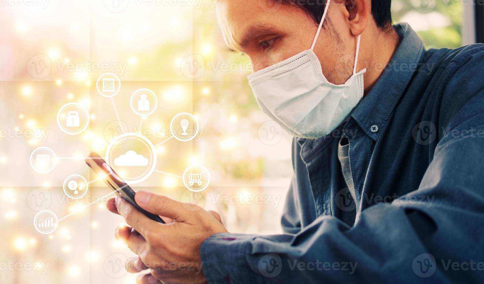 Man using smartphone with icon data technology photo