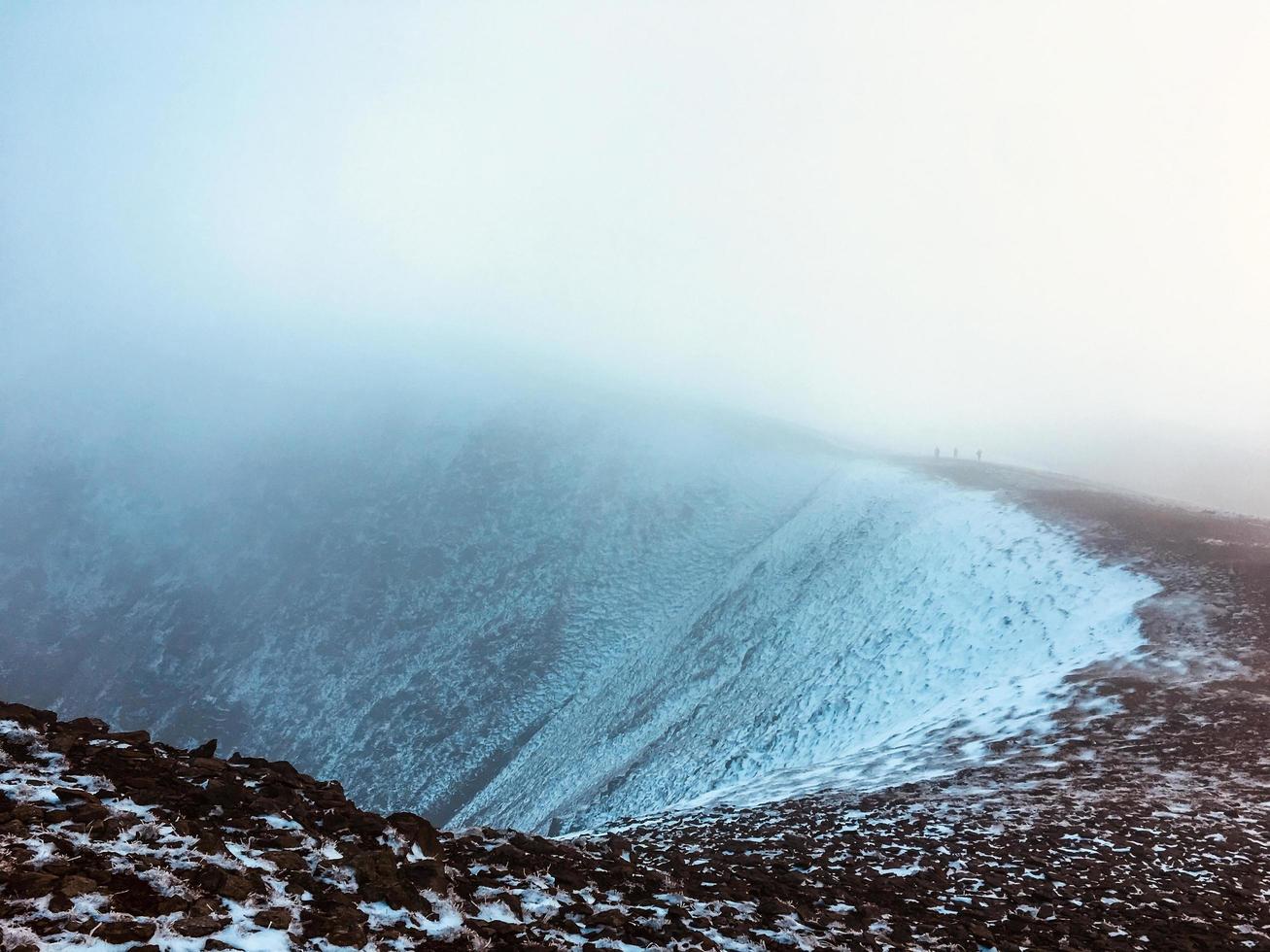 mysterious mountains with people photo