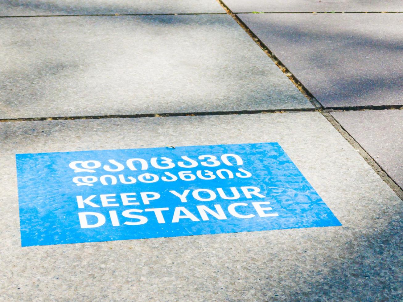keep your distance sign photo