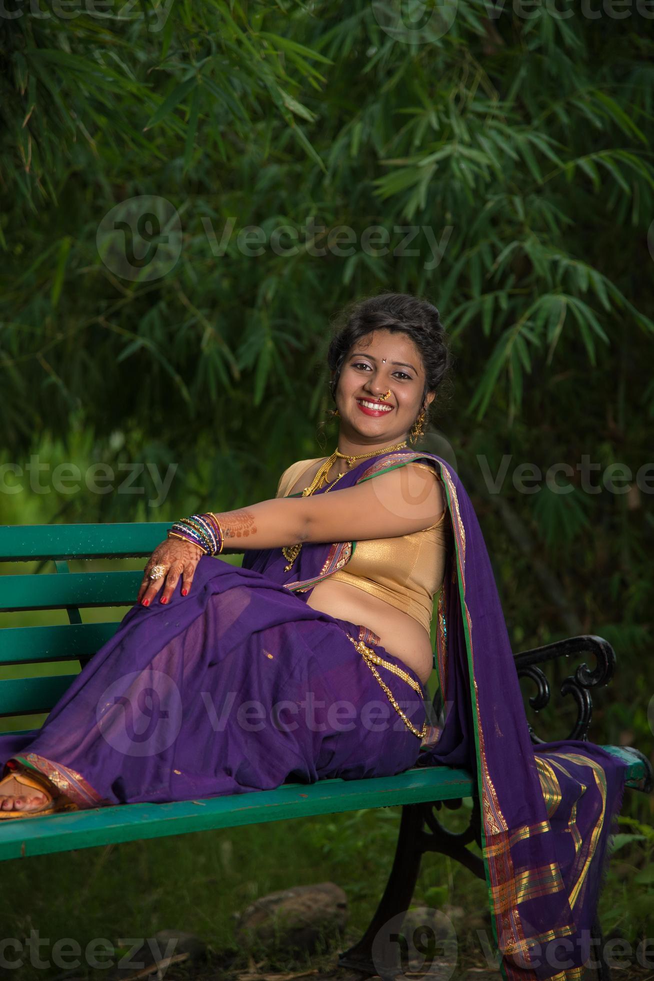 Indian Traditional Beautiful young girl in saree posing outdoors 4983076  Stock Photo at Vecteezy