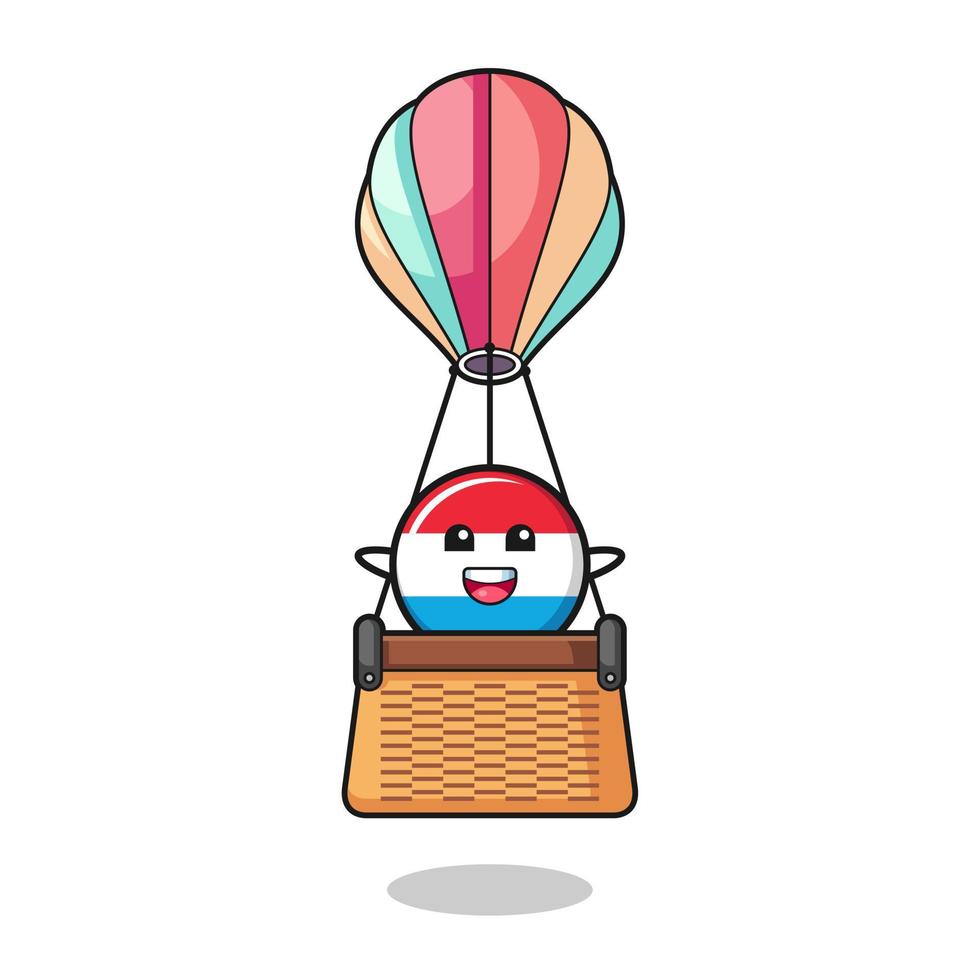 luxembourg mascot riding a hot air balloon vector