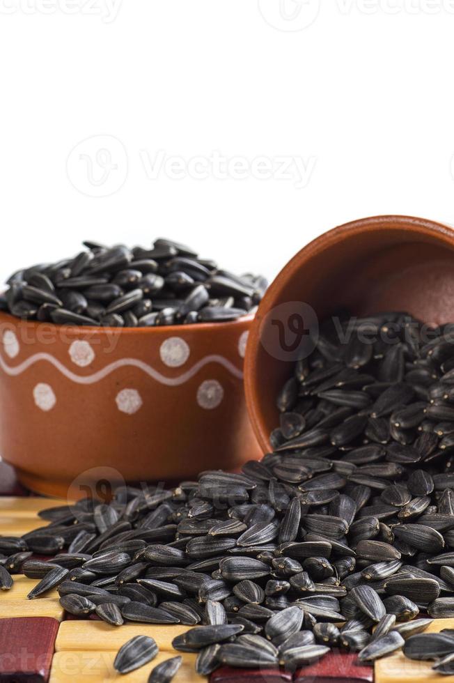 Sunflower Seeds Helianthus annuus on white background. photo