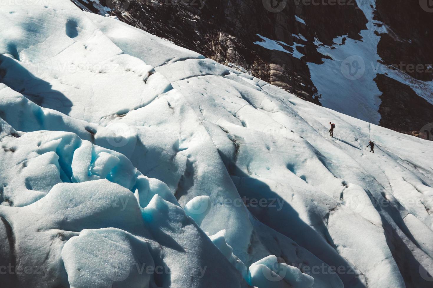 Beautiful scenery on the mountains and the glacier Svartisen landscape in Norway scandinavian nature landmarks ecology concept. Blue snow and ice photo