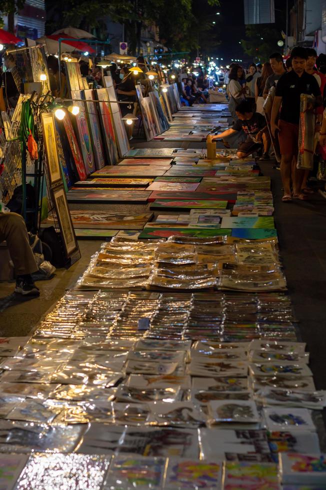 Chiang Mai Walking Street CHIANG MAI THAILAND12 JANUARY 2020A local handicraft market made from silkceramicsmetalglasswood or art and food Thai tourists and foreigners enjoy walking and shopping photo