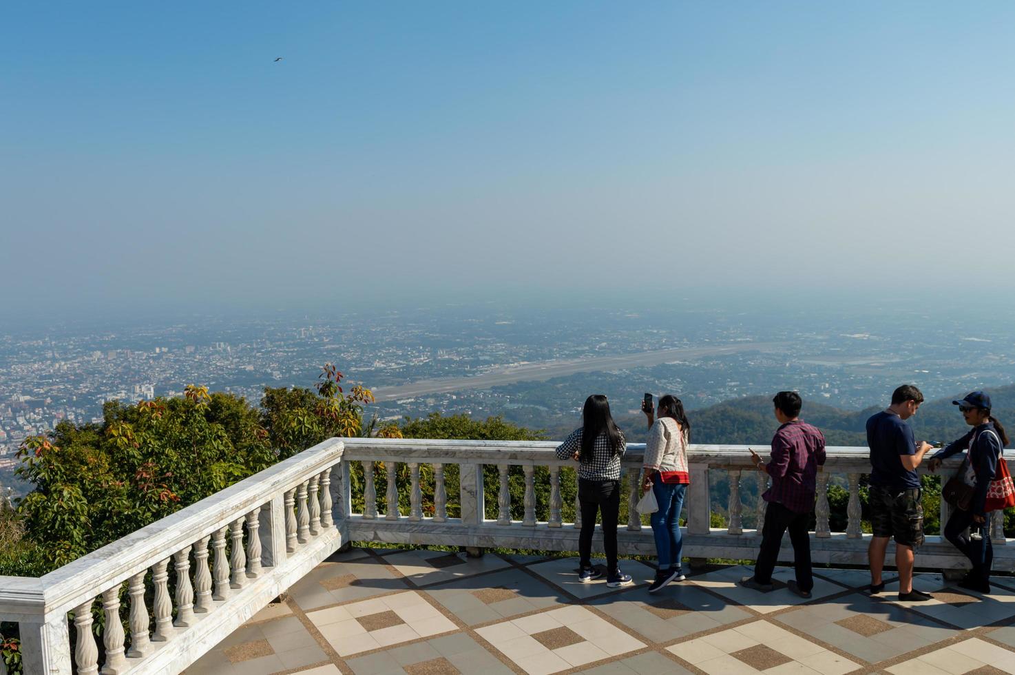 CHIANG MAI THAILAND12 JANUARY 2020Chiang Mai City 'sLandscape view of Doi Suthep Tourists taking pictures and taking in the city views of Chiang Mai. photo