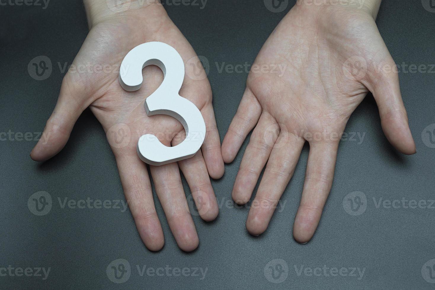 On the female palms figure three. photo