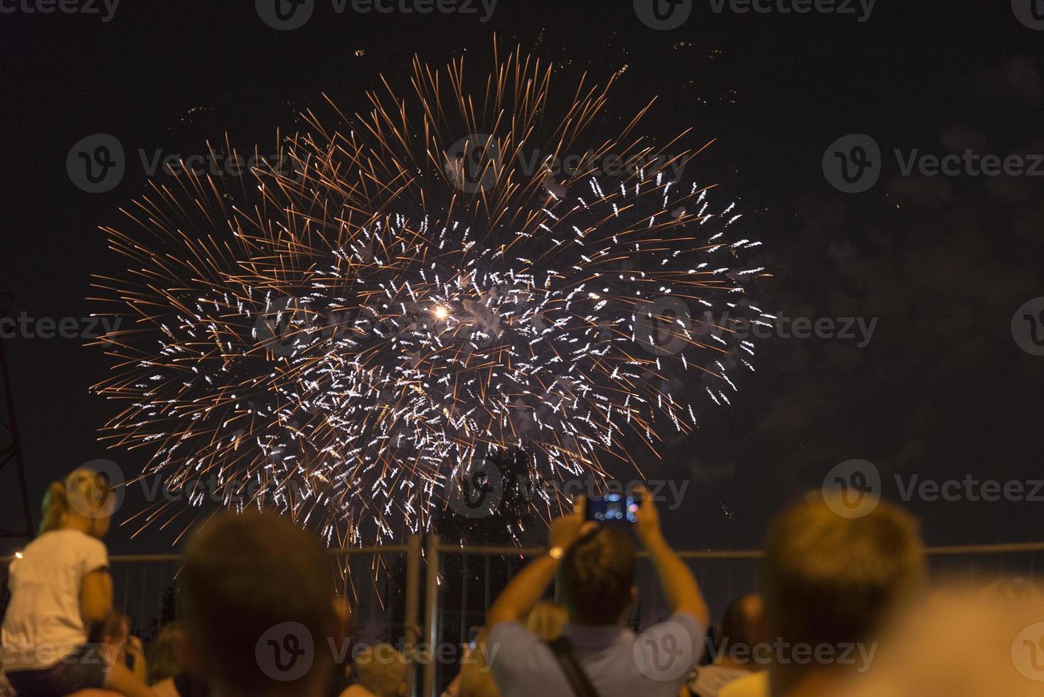 Fireworks in the night sky on a holiday. photo