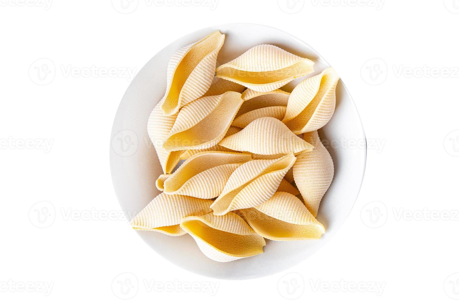 Conchiglioni raw pasta royal seashells food background photo