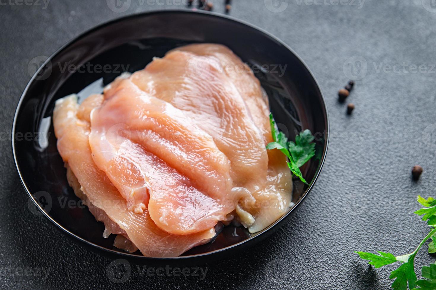 rebanadas de pechuga de pollo carne fresca aves de corral fondo de alimentos foto