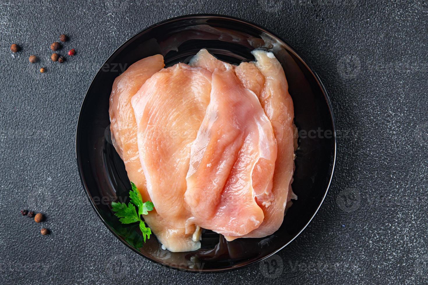 rebanadas de pechuga de pollo carne fresca aves de corral fondo de alimentos foto